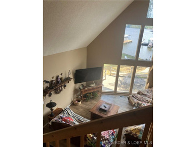> A wall of windows and vaulted ceilings. Main level living! Big - photo 31