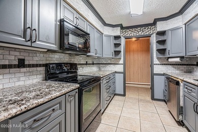 Welcome to this spacious two-story townhouse offering