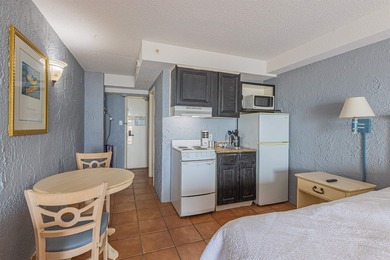 PRICED TO SELL. Rarely do oceanfront ground level condos become