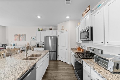 This beautiful 4-bedroom, 2-bath home in the sought-after - photo 3