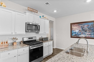 This beautiful 4-bedroom, 2-bath home in the sought-after - photo 4