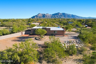 Perched on a serene hilltop in La Canada Foothills, this