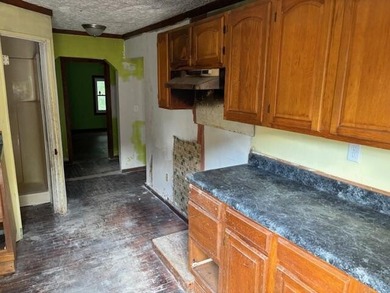 Reduced to $59,900! This 3-bedroom, 2 bath home located near