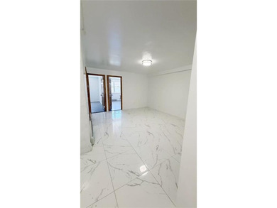 Two dwelling brick house in prime of Bath Beach featuring a - photo 3