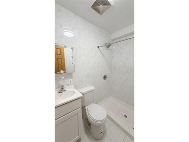 Two dwelling brick house in prime of Bath Beach featuring a - photo 8
