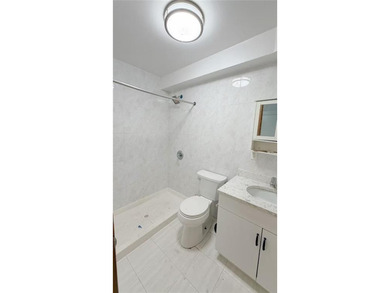 Two dwelling brick house in prime of Bath Beach featuring a - photo 9