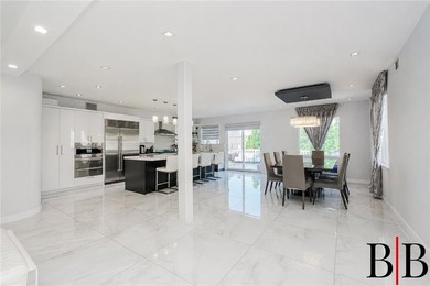Tucked away in the heart of Bergen Beach sits this elegantly - photo 8