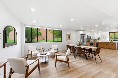 This stunning 4-bedroom, 2.5-bath end-unit residence in the Park - photo 1