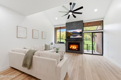 This stunning 4-bedroom, 2.5-bath end-unit residence in the Park - photo 2