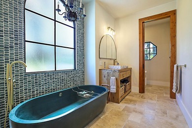 Numerous luxury upgrades! Newer roof, complete impact - photo 33