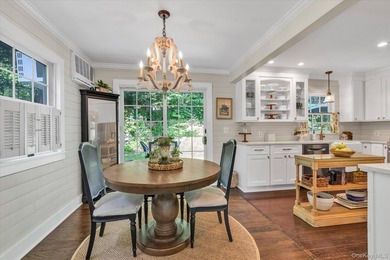 Welcome to this mint-condition Cape Cod nestled on a quiet - photo 1