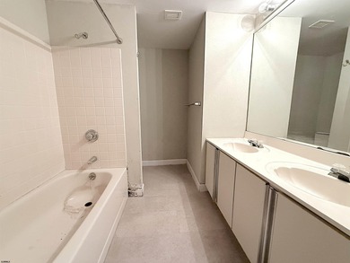 Spacious 1 bedroom, 1.5 bath condo with some ocean and bay views - photo 9