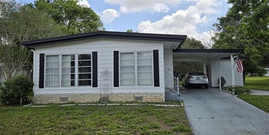 Move-in-ready 2-bedroom, 2-bath home in Zellwood Station, with - photo 1
