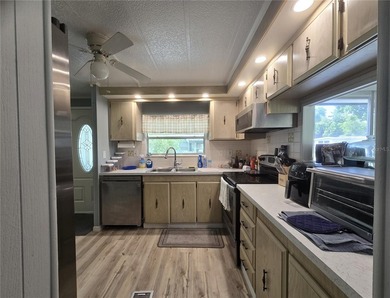 Move-in-ready 2-bedroom, 2-bath home in Zellwood Station, with - photo 6