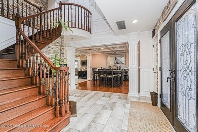 Welcome to 699 Ionia Avenue, a stunning brick-front center hall - photo 5
