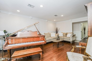 Welcome to 699 Ionia Avenue, a stunning brick-front center hall - photo 7