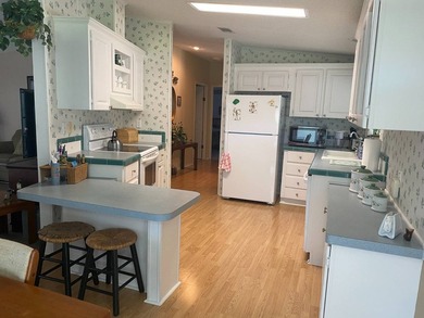 This 1997 Palm Harbor home features 1,170 SF + Lanai with an - photo 3