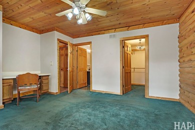Welcome to this beautiful waterfront log home tucked away on a - photo 10
