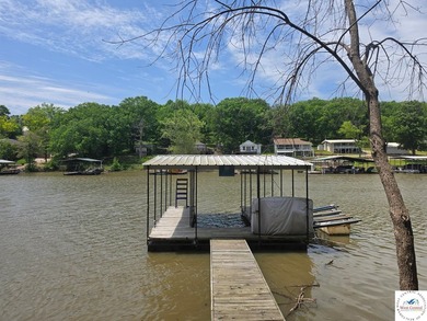 Discover refined lakeside living in this impeccably maintained - photo 4