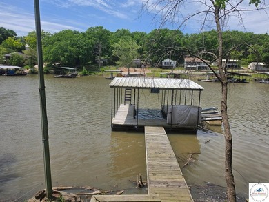 Discover refined lakeside living in this impeccably maintained - photo 5