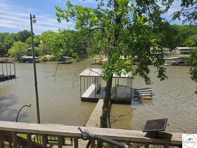 Discover refined lakeside living in this impeccably maintained - photo 6