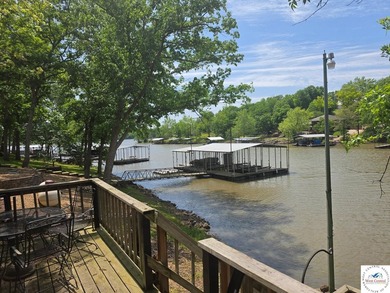 Discover refined lakeside living in this impeccably maintained - photo 7