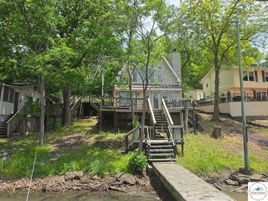 Discover refined lakeside living in this impeccably maintained - photo 9