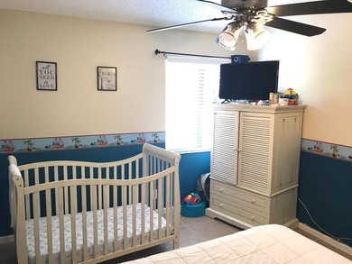 Beautiful 2/2 condo with 1,128 sqft, vaulted ceilings, ceramic - photo 12