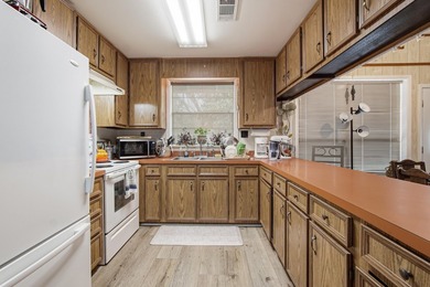 Tucked away in the heart of Santa Rosa Beach, this charming and - photo 15