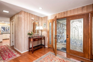 Set along the peaceful shores of Lake Toxaway, this inviting - photo 3