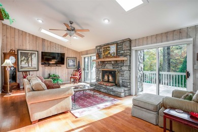 Set along the peaceful shores of Lake Toxaway, this inviting - photo 4