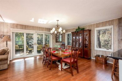 Set along the peaceful shores of Lake Toxaway, this inviting - photo 10