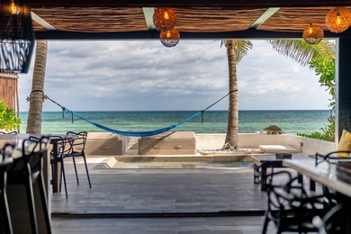 This beach house is absolutely amazing! Located in a beautiful - photo 1