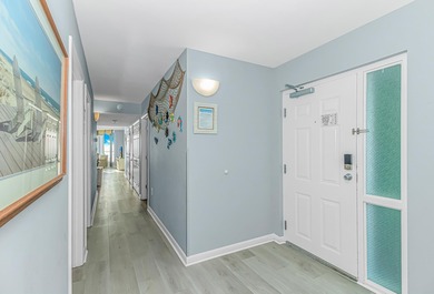 Experience the pinnacle of coastal living in this exquisite