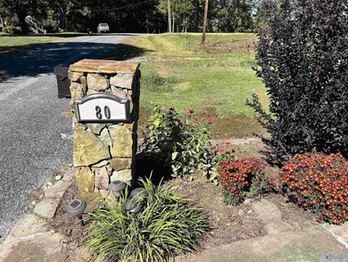 This stunning 4 bed 3.5 bath home on Weiss Lake offers - photo 2
