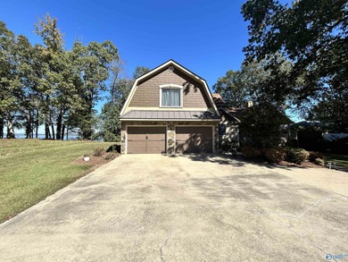 This stunning 4 bed 3.5 bath home on Weiss Lake offers - photo 4