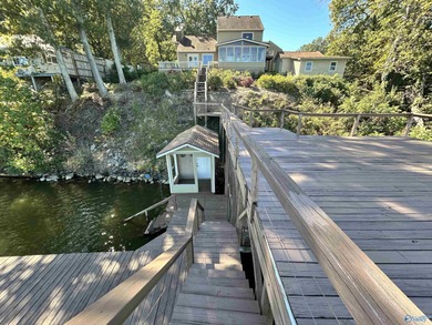 This stunning 4 bed 3.5 bath home on Weiss Lake offers - photo 8