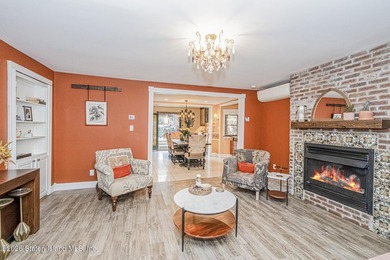 Welcome to this well-maintained three-family home in the highly - photo 4
