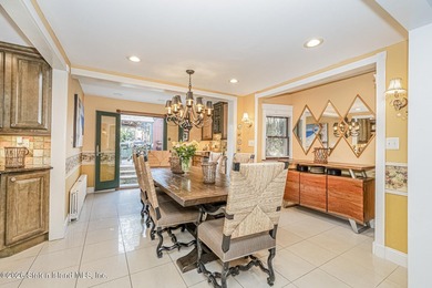 Welcome to this well-maintained three-family home in the highly - photo 8