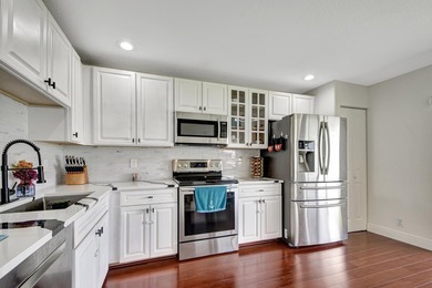 RENOVATED CORNER UNIT: 4BR/2.5BA w/ WATERFRONT FOUNTAIN views in - photo 9