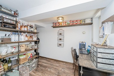 Welcome to this well-maintained three-family home in the highly - photo 10