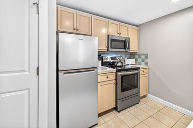 THIS BEAUTIFUL CORNER UNIT HAS BOTH BAY AND RESORT VIEWS! - photo 5
