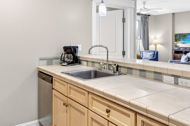 THIS BEAUTIFUL CORNER UNIT HAS BOTH BAY AND RESORT VIEWS! - photo 7
