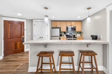 THIS BEAUTIFUL CORNER UNIT HAS BOTH BAY AND RESORT VIEWS! - photo 8