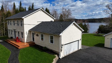 Welcome to an exceptional lakefront lifestyle on the shores of - photo 2