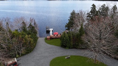 Welcome to an exceptional lakefront lifestyle on the shores of - photo 5