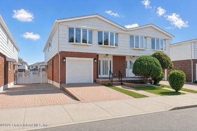 Two Family Semi-Attached home with full finished basement. Home - photo 1
