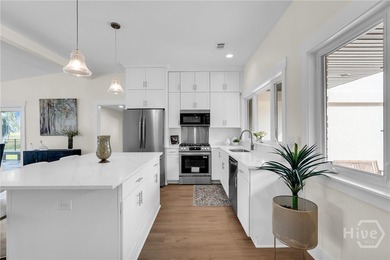 Perched on deep water along Richardson Creek, this reimagined - photo 13