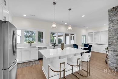 Perched on deep water along Richardson Creek, this reimagined - photo 16