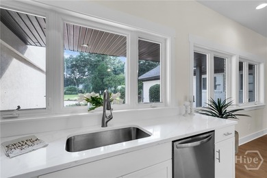 Perched on deep water along Richardson Creek, this reimagined - photo 18